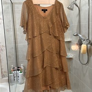 Light gold tiered dress. Stretchy fabric. Worn once!! Great for wedding or party